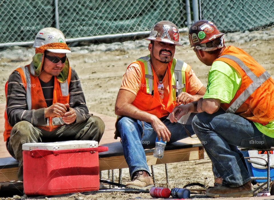 Construction Engineers. Construction workers enjoying a break