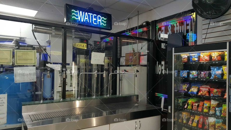 Water Counter, indoors at laundromat.
