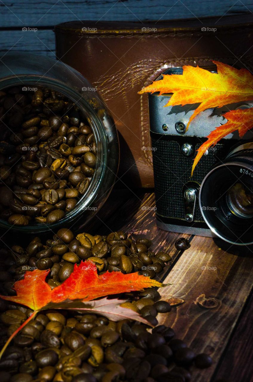 coffee been still life on wooden background