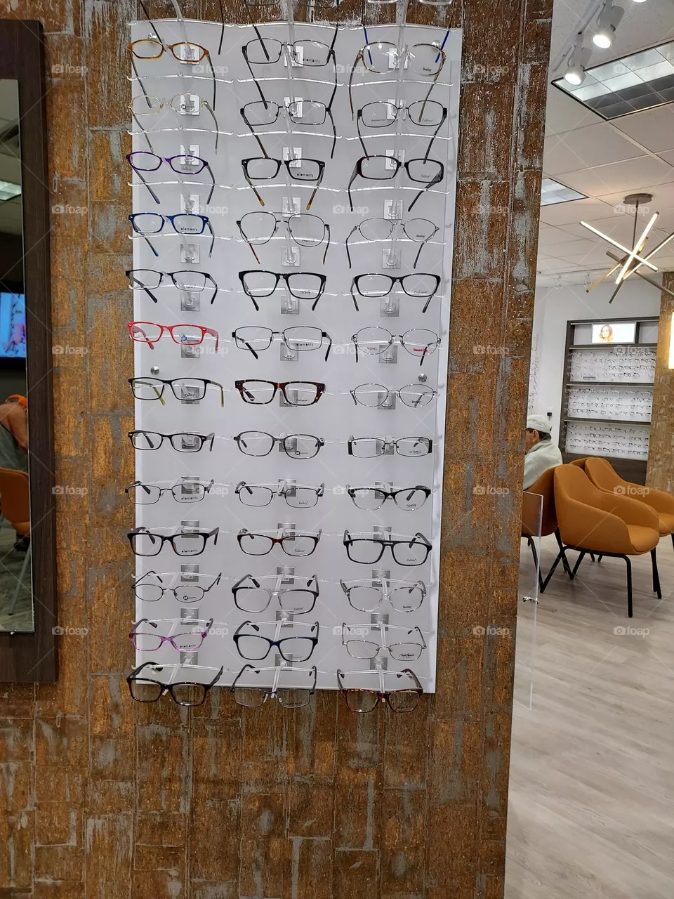 at the eye place with my husband.  he's just getting checked after cataract surgery.