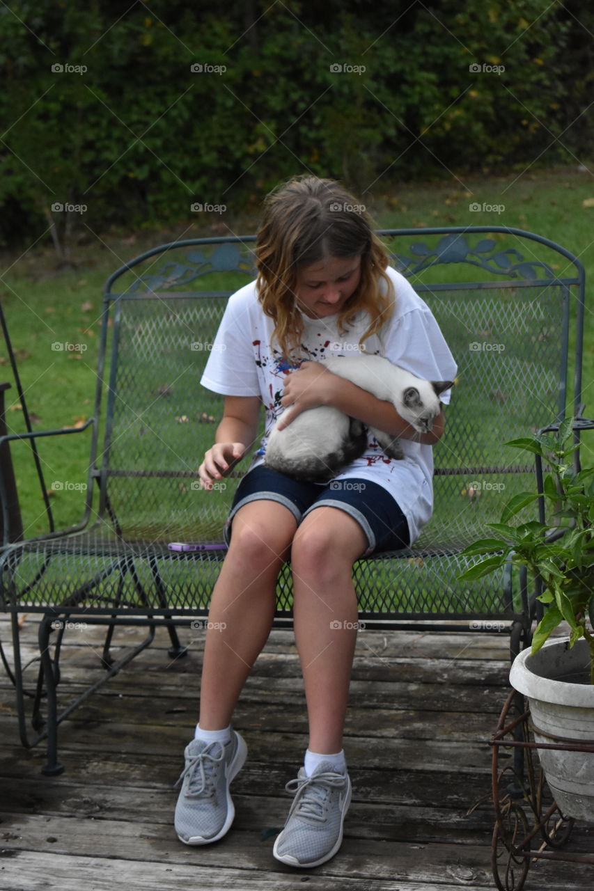 Holding One Of The Cats