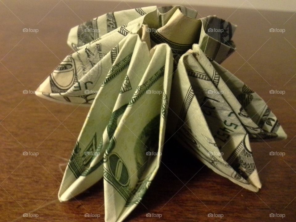 A Spiral made out of four $20 bills