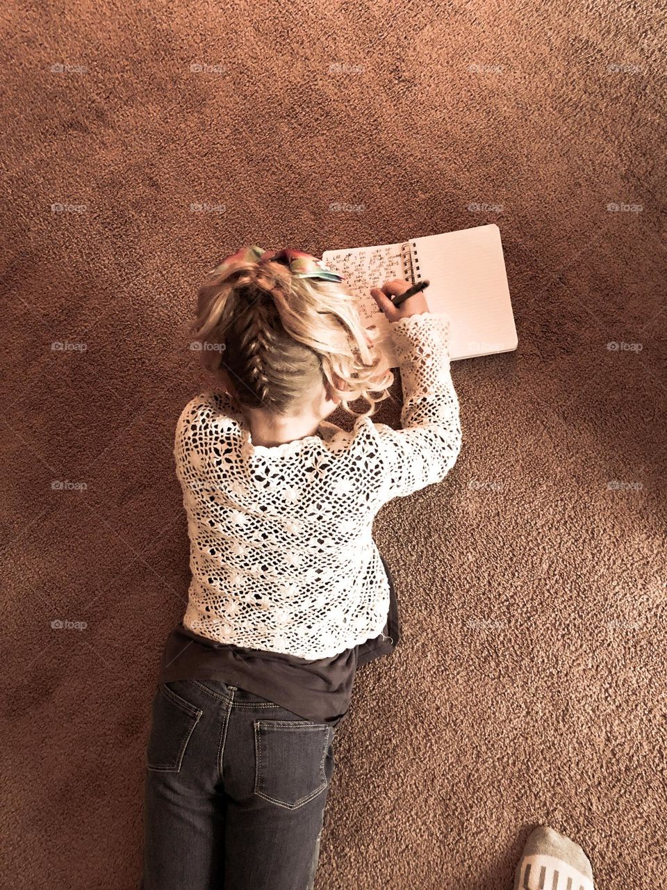 Girl journaling her dream 