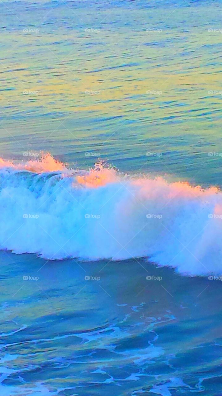 "Red Flag Waves At Sunset"