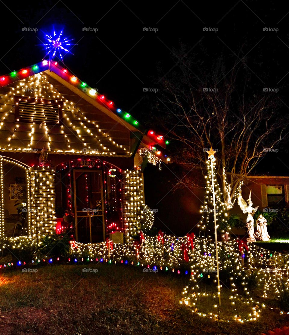Lights galore on a Bungalo home. 
