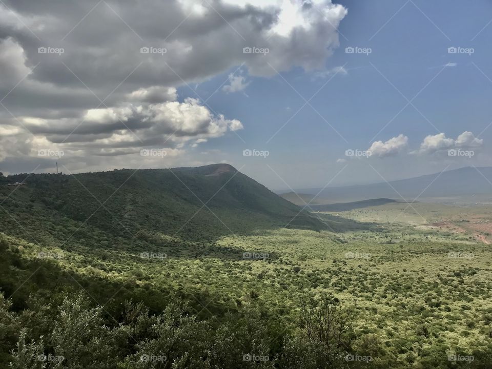 cloud - sky landscape environment scenics - nature beauty in Nature mountain tranquil scene Tranquility Nature Land day no people non-urban scene Plant Field outdoors mountain range idyllic Growth in Gitithia, Kenya