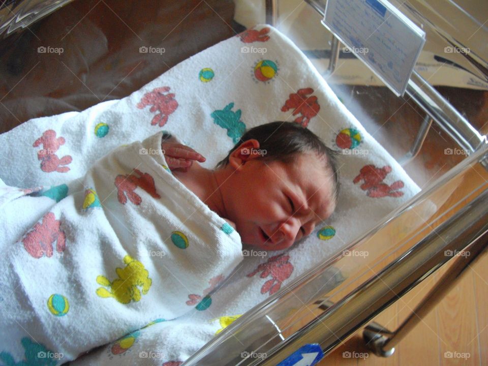 Newborn Baby Boy In Maternity Ward
