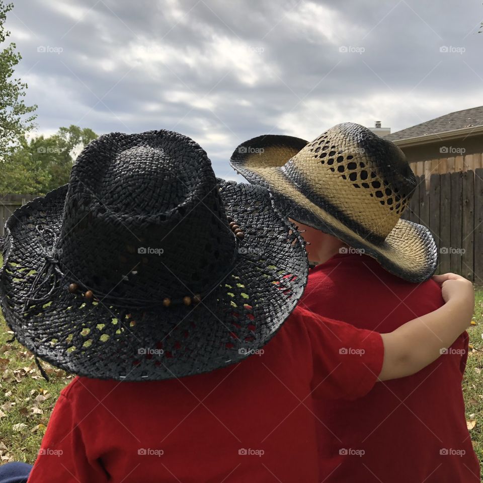 A nice day and cowboy friends share a chat
