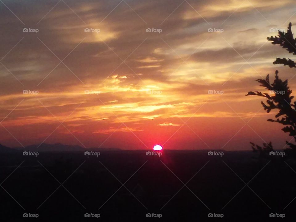 Sun Sets with a fiery red