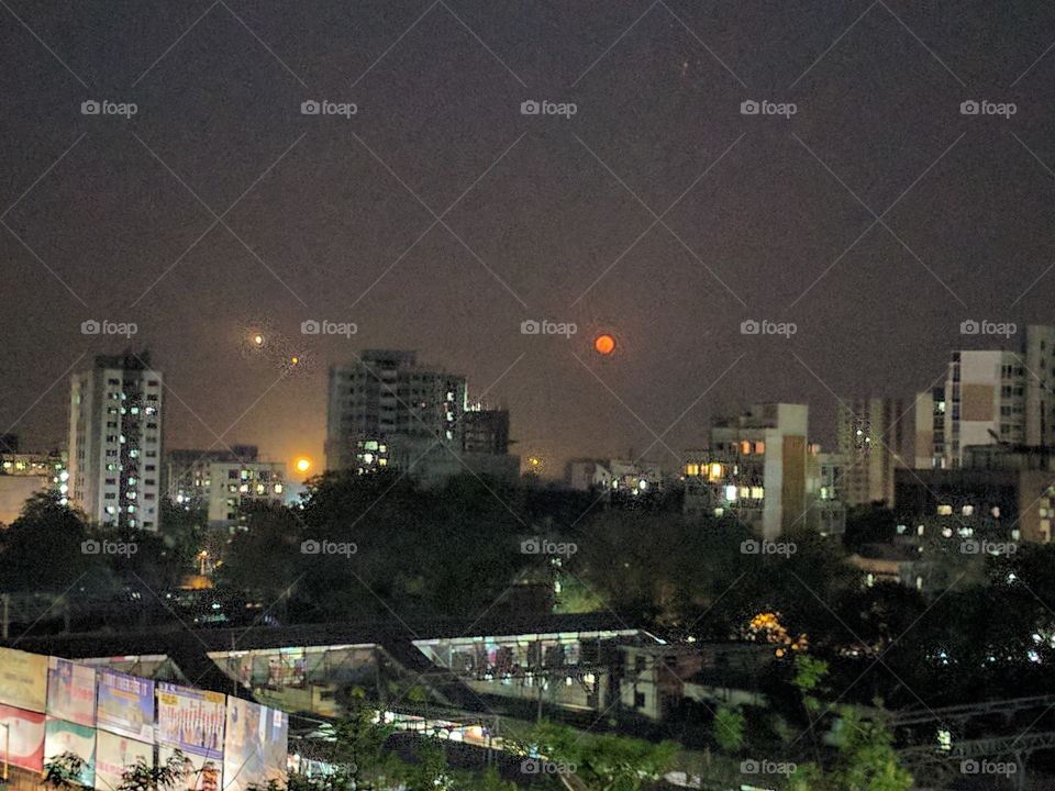 Red moon rise at Mumbai