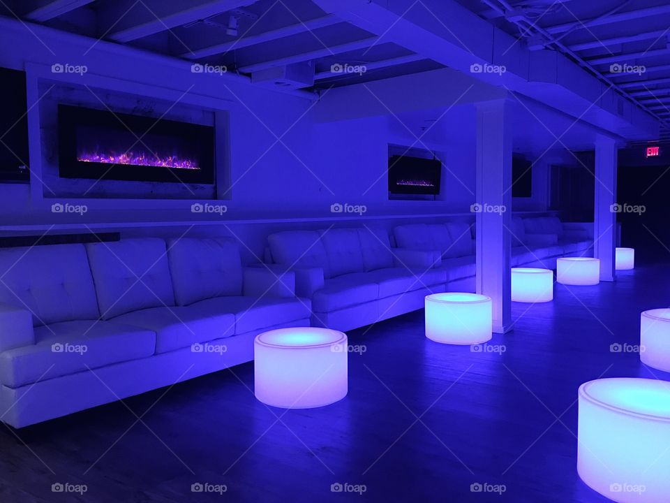 Nightclub vibes with a blue glow.