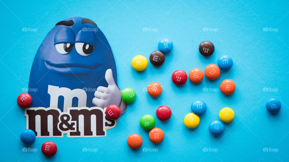 M&M's mascot on blue background