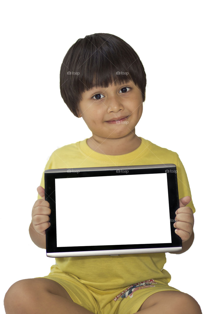 Kid holding tablet. Selling your product