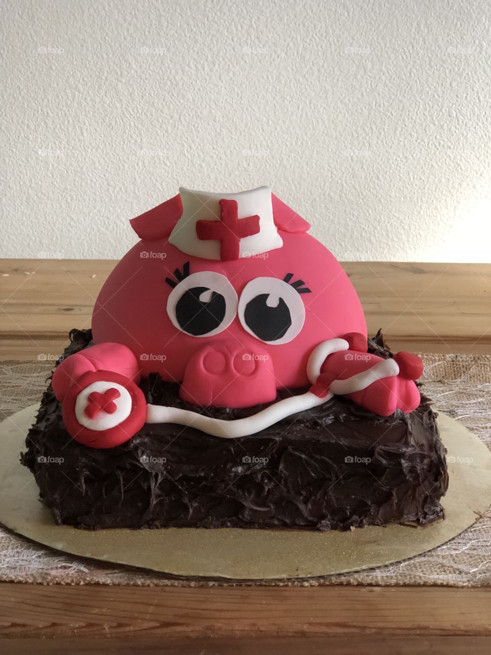 The cake, to the camera, to our local nurses
