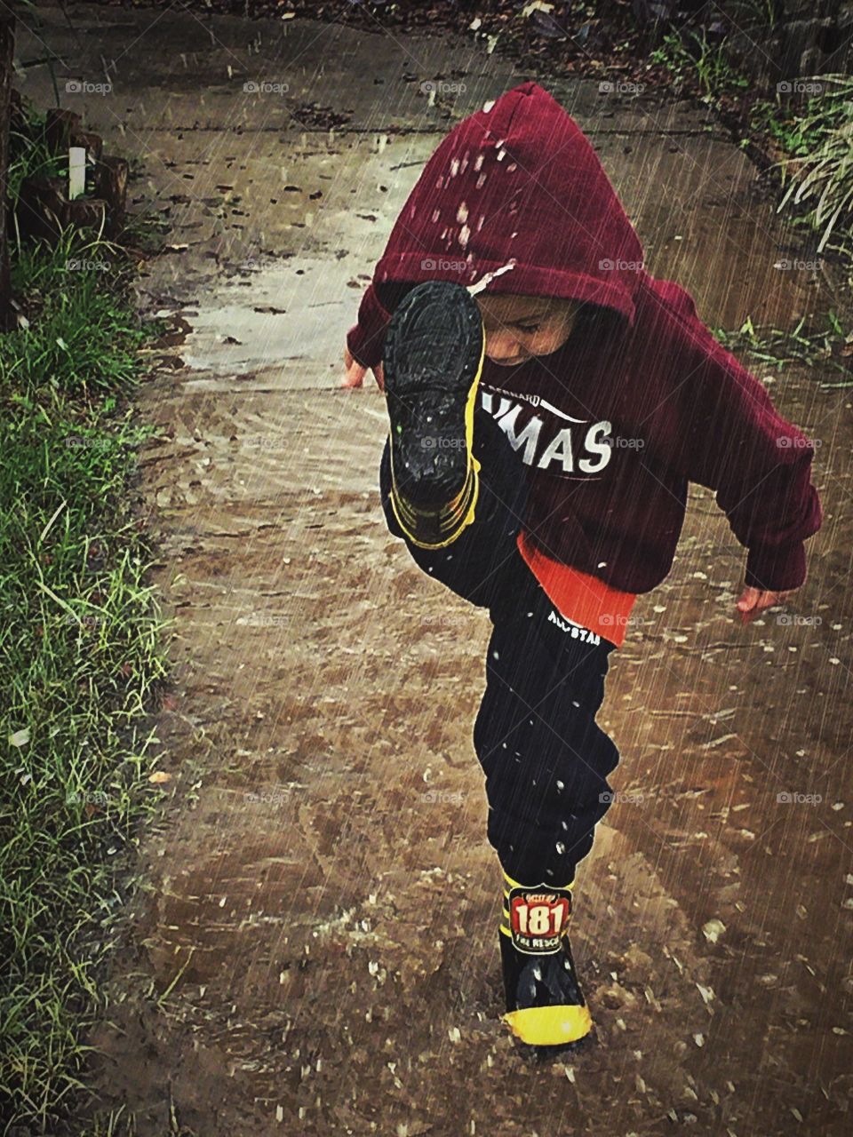 Playing in the rain puddles