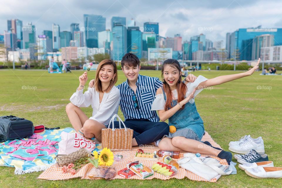 Go picnic with friends and together enjoying the summer together surrounded by colourful food and props