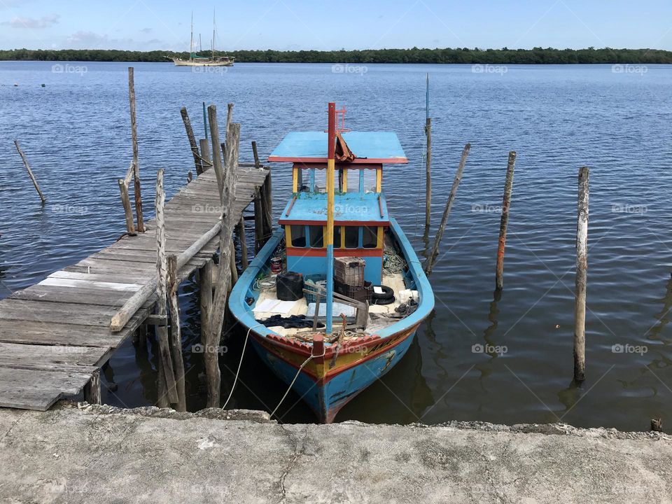 fishing boats moored at the port of Caravelas, Bahia