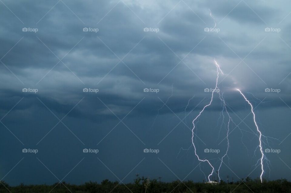 lightning bolt gray sky storm clouds dark dusk