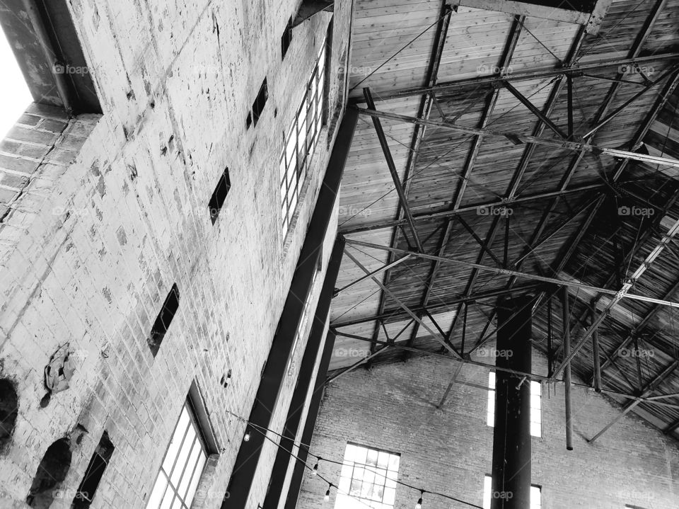 black white old warehouse brick metal windows