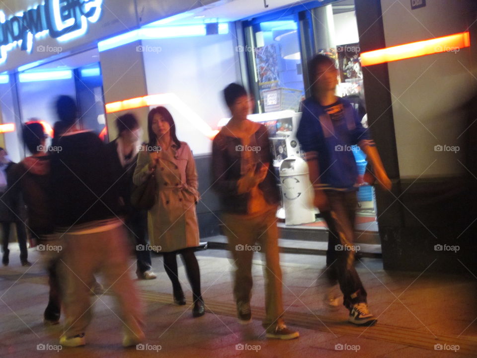 One Businesswoman Stands Out in a Crowd of Young Men in Trendy, Non-traditional Akihabara, Tokyo, Japan