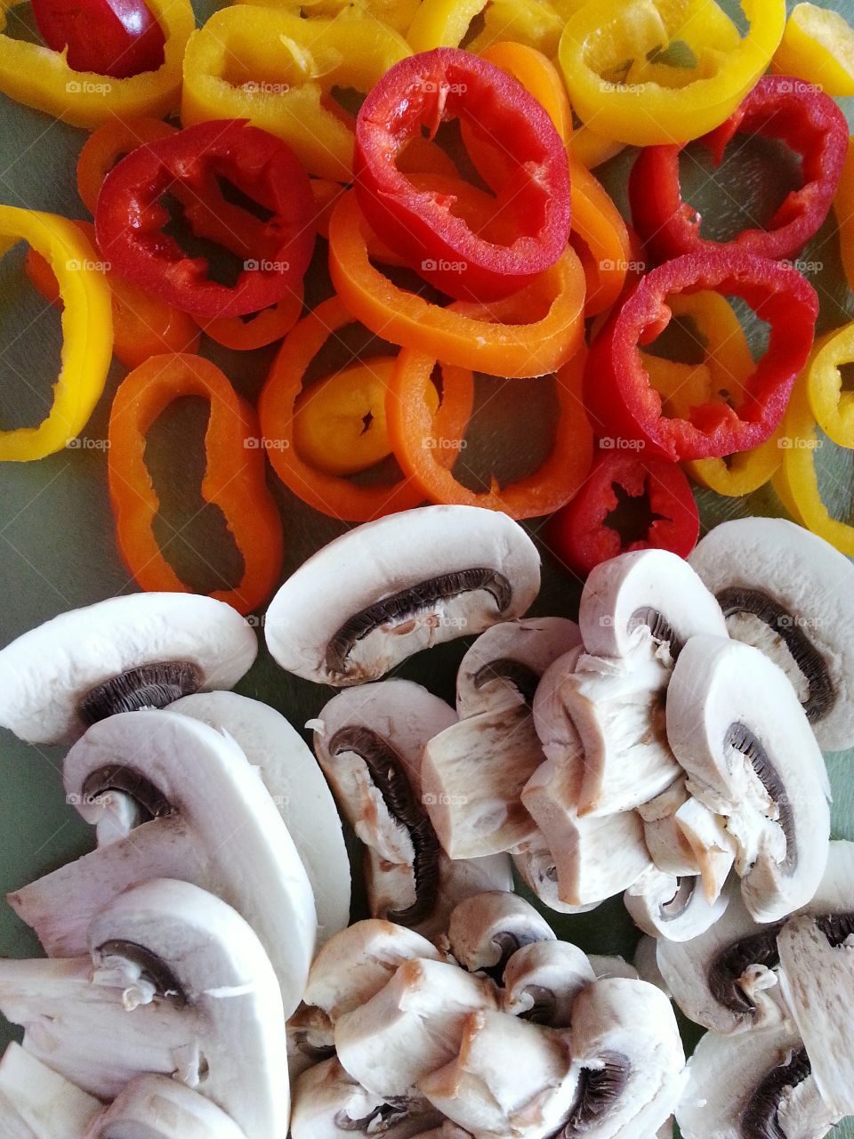 mushrooms and peppers. sliced mushrooms and sweet colorful peppers