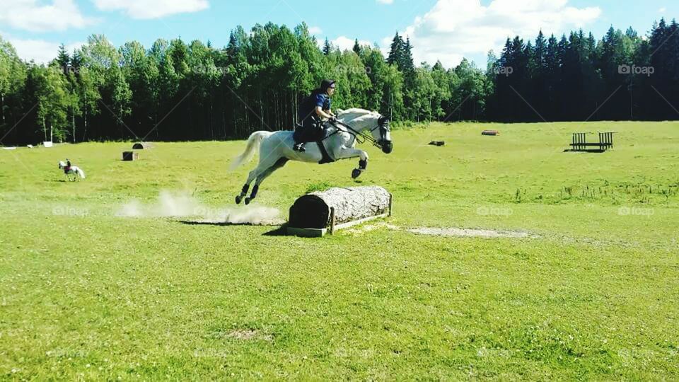 Man ridding on horse