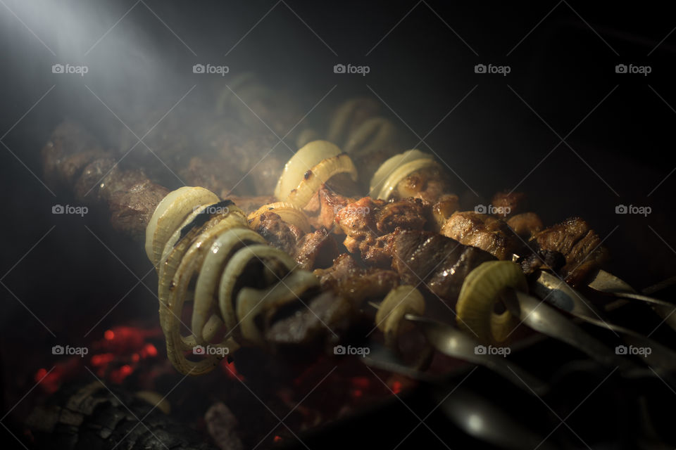 Shish kebab, shashlik in light of flashlight
