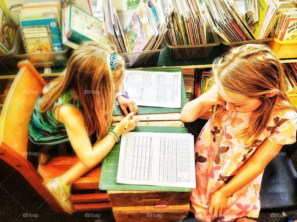 Young Children Reading At School