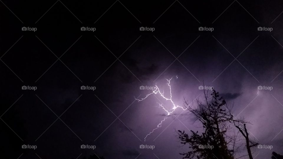 Good timing. Good timing taking a picture of a lightning bolt during a tornado storms