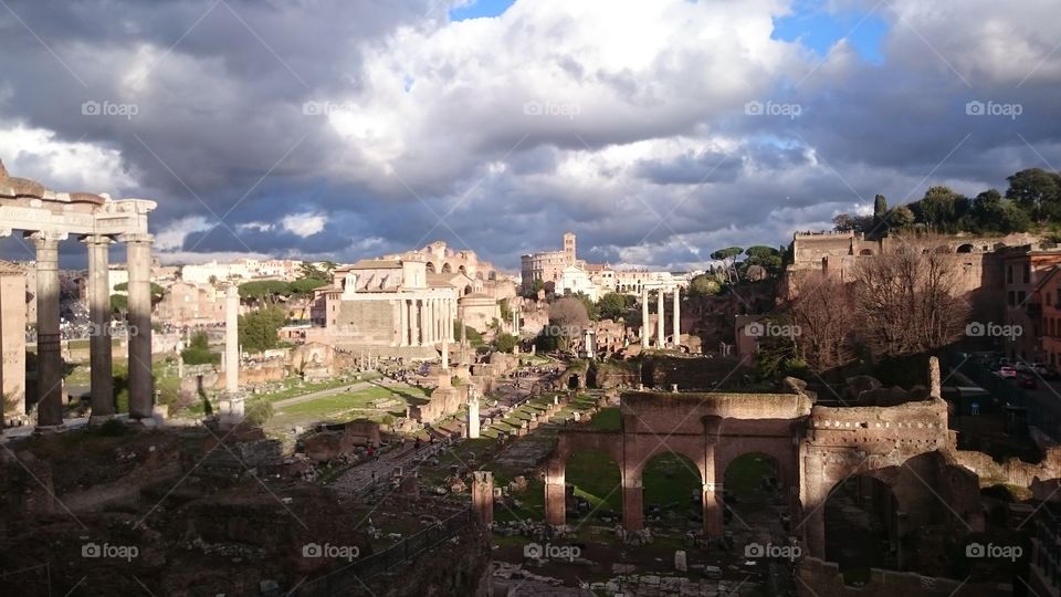 Ancient Rome in incredible twilight, sun and clouds - Forum Romanum