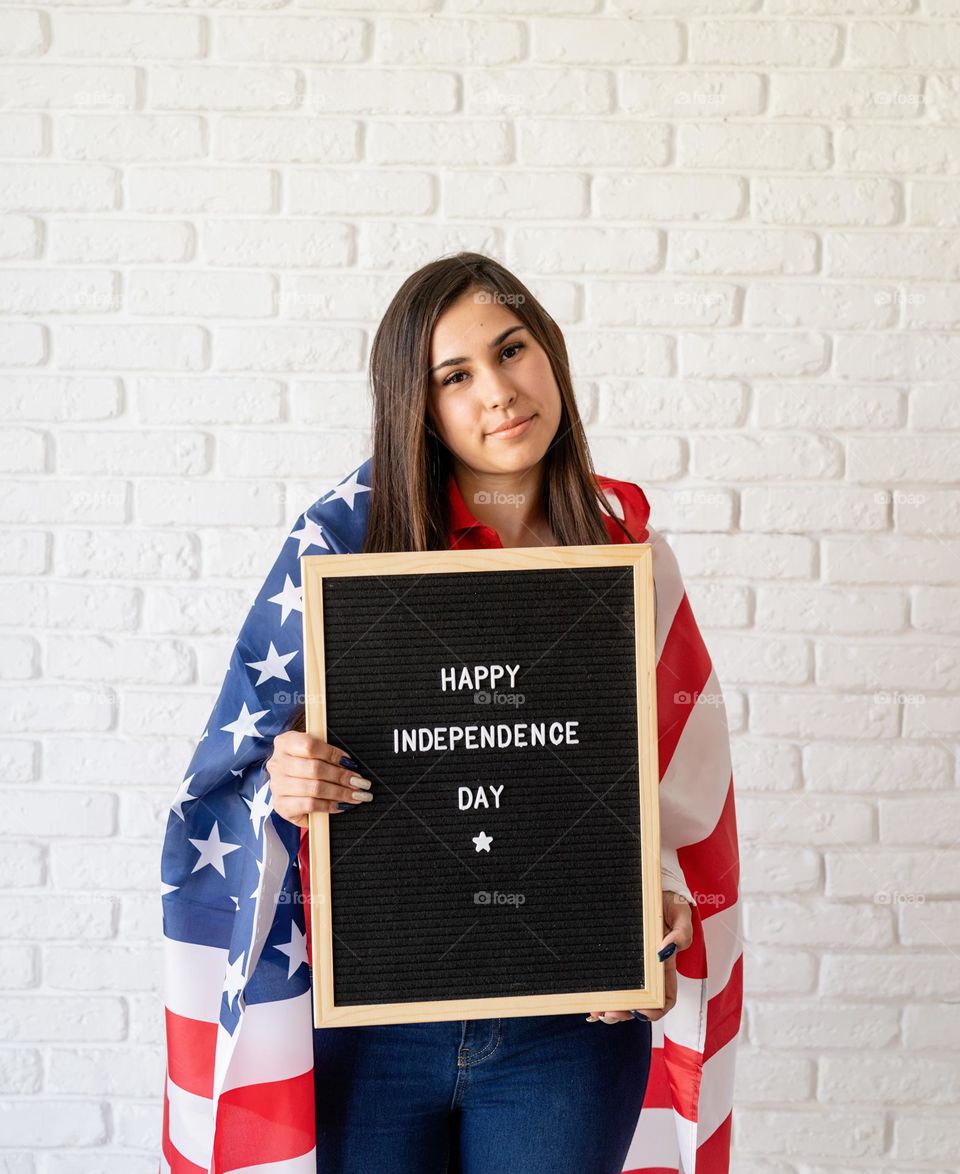 woman holding USA flag