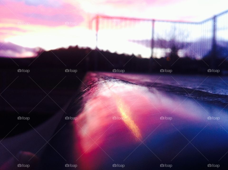 *No Filter* Took this a few years ago, Standing on the top of a ramp in a skatepark, The sunset was beaming on the edge and reflecting off, Just had to get a photo of it! Great photo for any use!