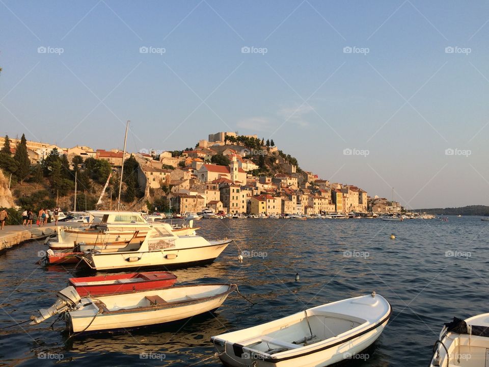 Harbour with village on top of the hill