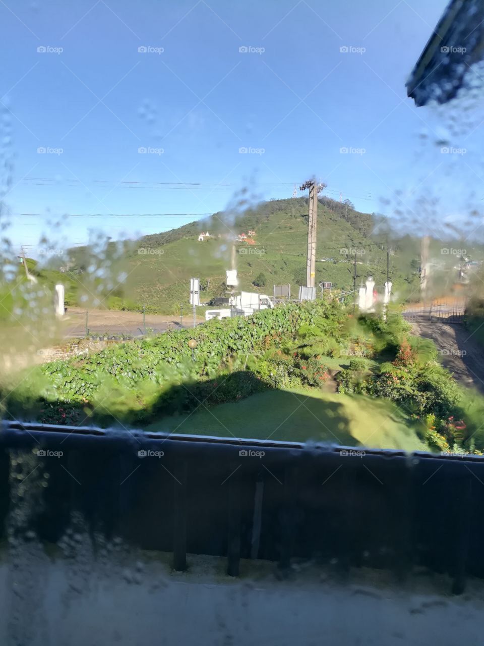 Morning dawn break🤗after a foggy night.....love to stay near the window to view the front amidst drops of water💦💦