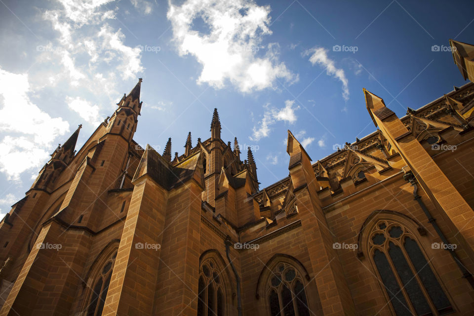 exploring australia's st. mary's  cathedral intricate architectural exterior in Sydney, NSW, shot from below, worms eye view