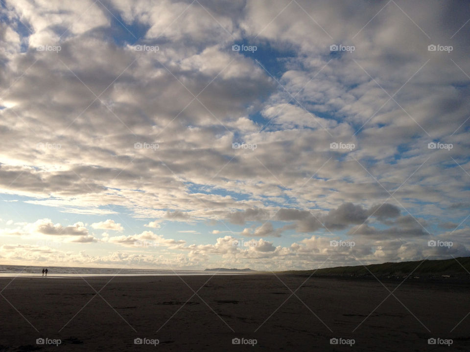 beach sky blue clouds by thepreissisright