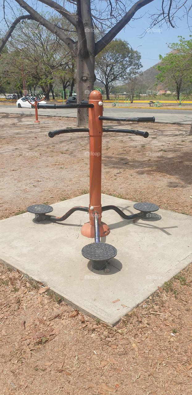 outdoor exercise station, wheels, weights, round, circles