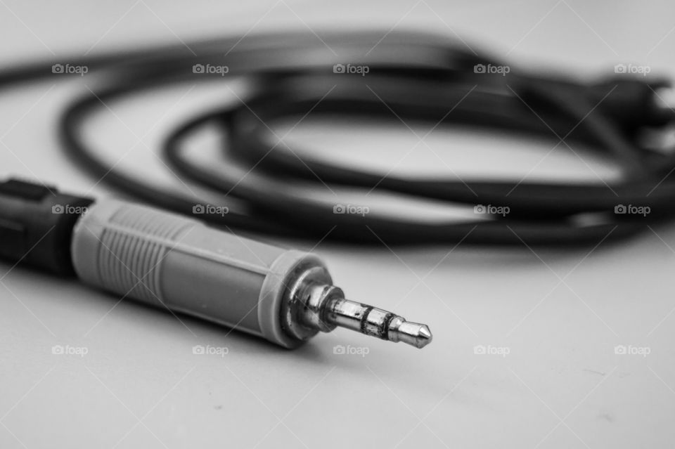 Jack cable on a table in black and white