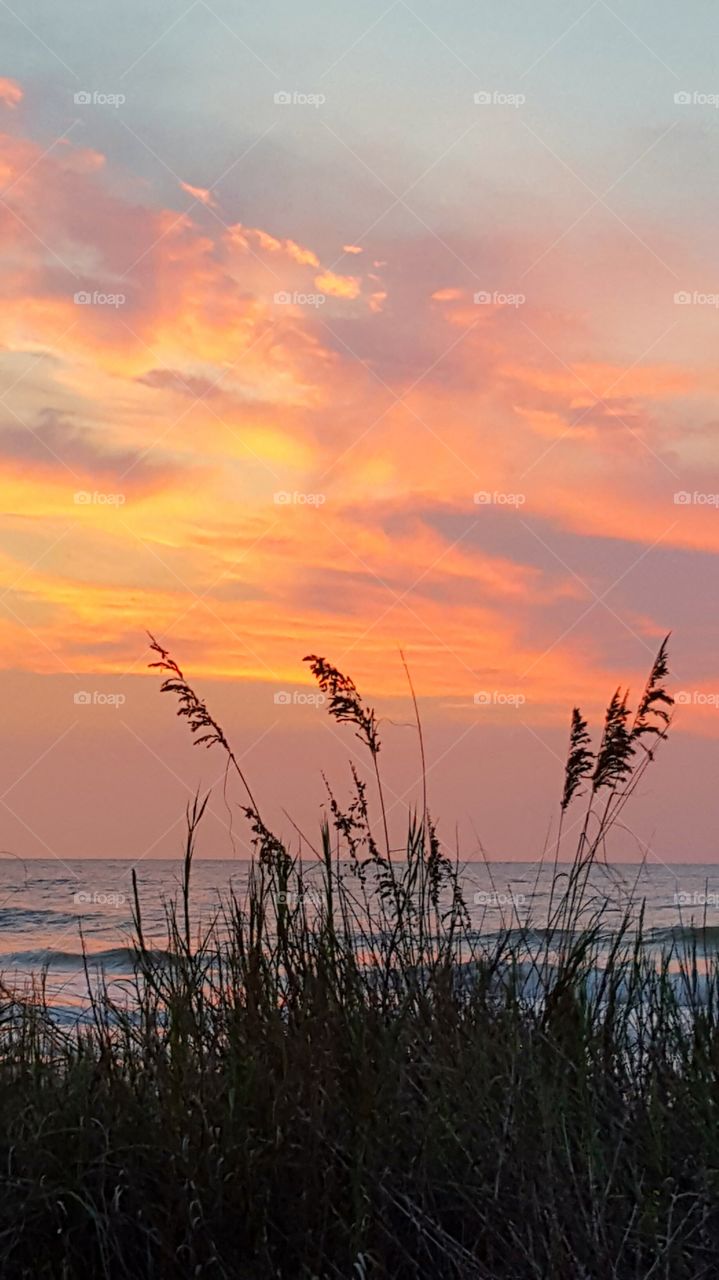 Scenic view of sea during sunset