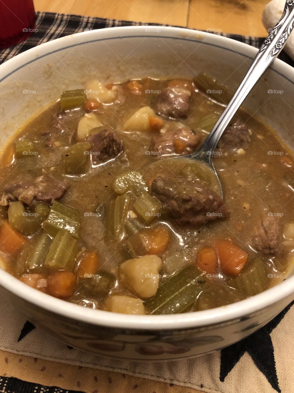 Homemade hot  bowl of beef stew & fresh veggies 