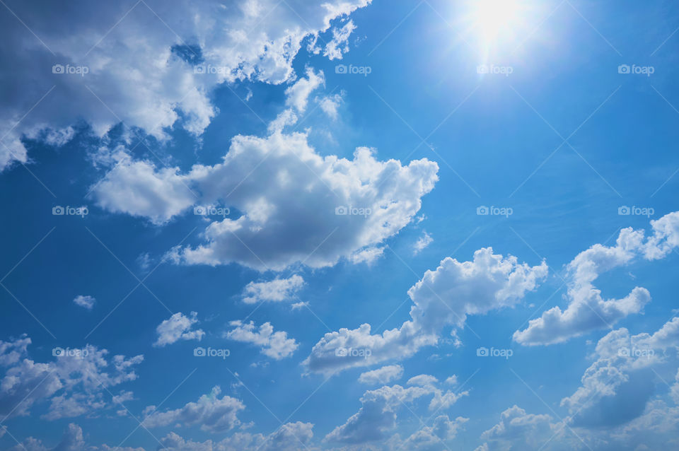 Sun with sky and blue sky background 