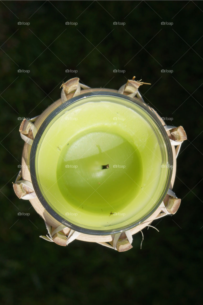 green glass candle lime by badpseudonym