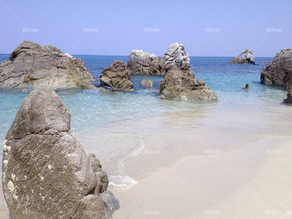 Rocks on sandy beach