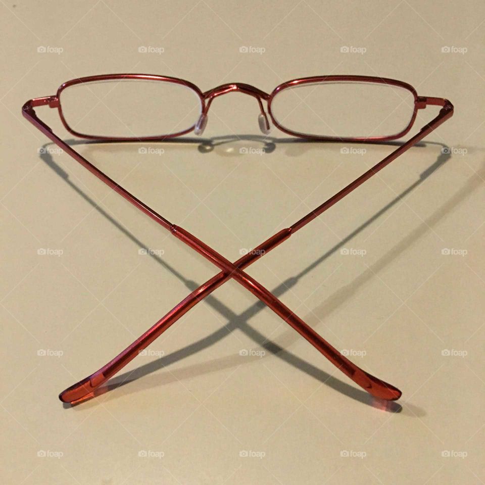 Red metal eyeglasses.