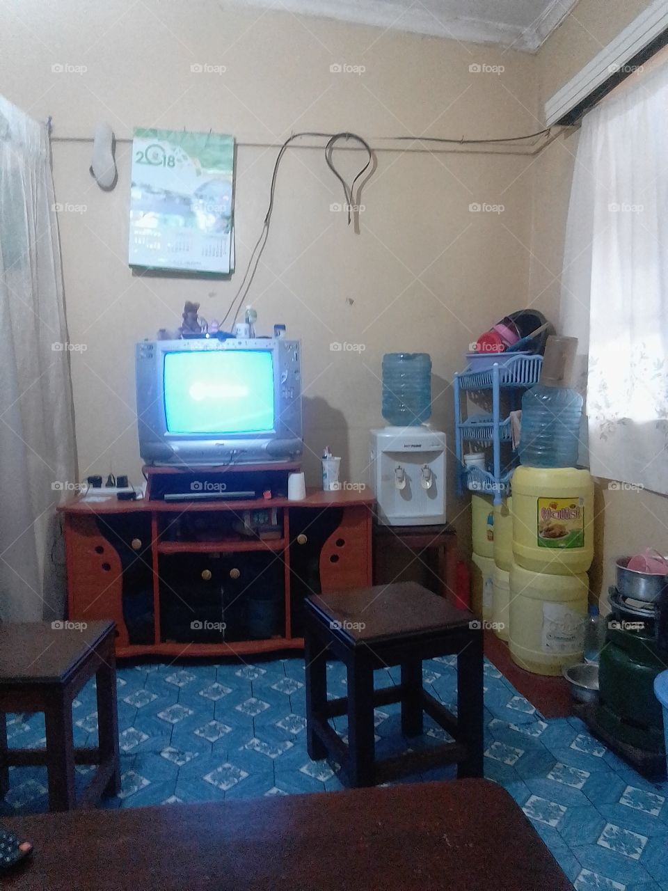 Furniture, household items, dispenser,gas,, curtains,,bottles and cool environment.
