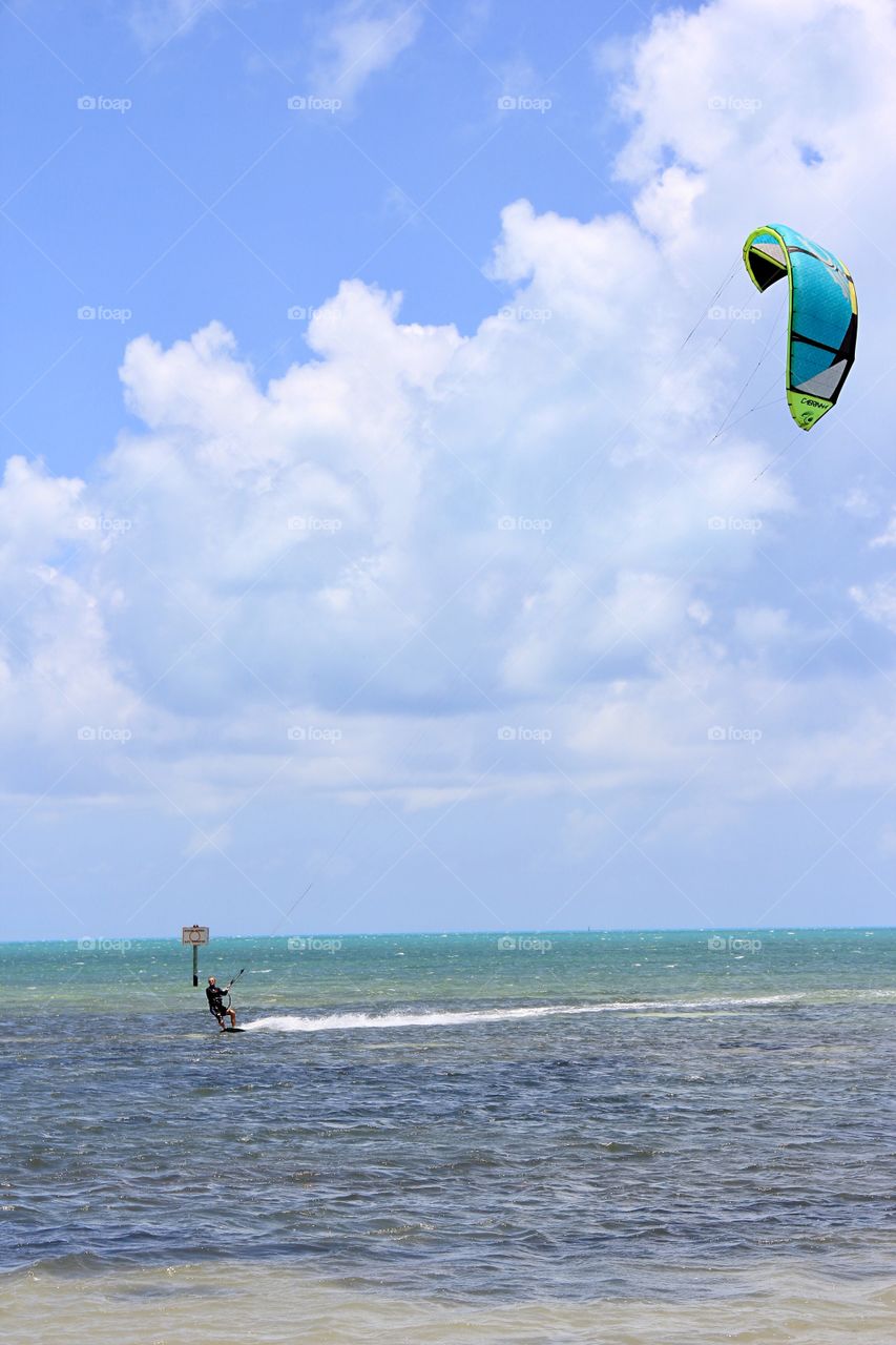 Kitesurfing in ocean 