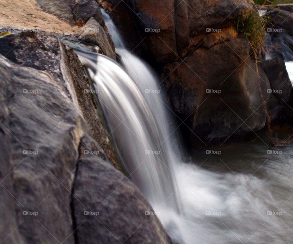 Flowing into the sea flowing into you waterfall