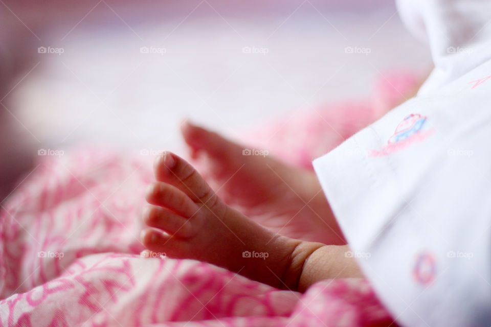 Close-up new born infant baby feet