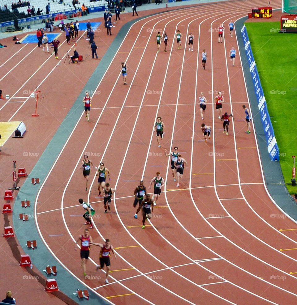 runners race relay olympic-stadium by lizajones