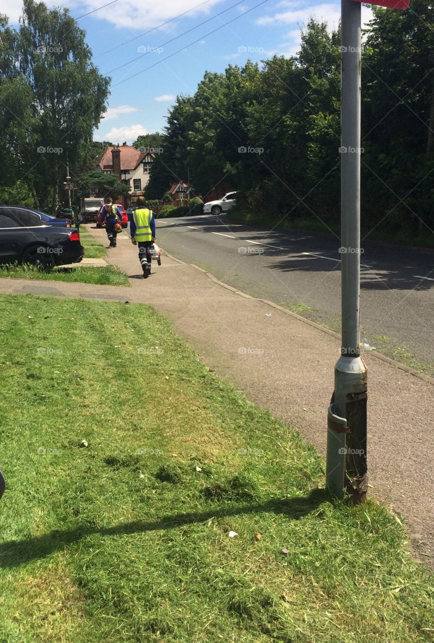 Council workers tending to grass verges 
